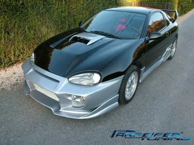 Front bumper + alu mesh grill with hole for round lamps