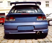 Rear spoiler under the rear window with brake light